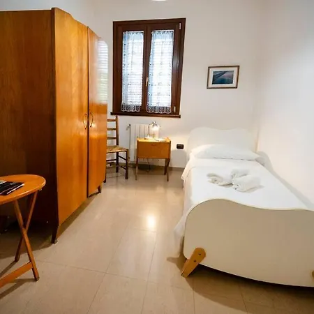 Апартаменты La Via Per Tharros *